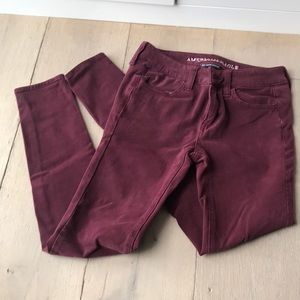 Burgundy high rise skinny jeans